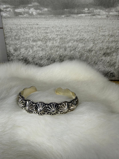 Repousse Stamped Cuff by Thomas Yazzie with Star Shots